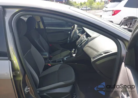 2014 Ford Focus Se z USA, uszkodzony, nr VIN 1FADP3F22EL433239